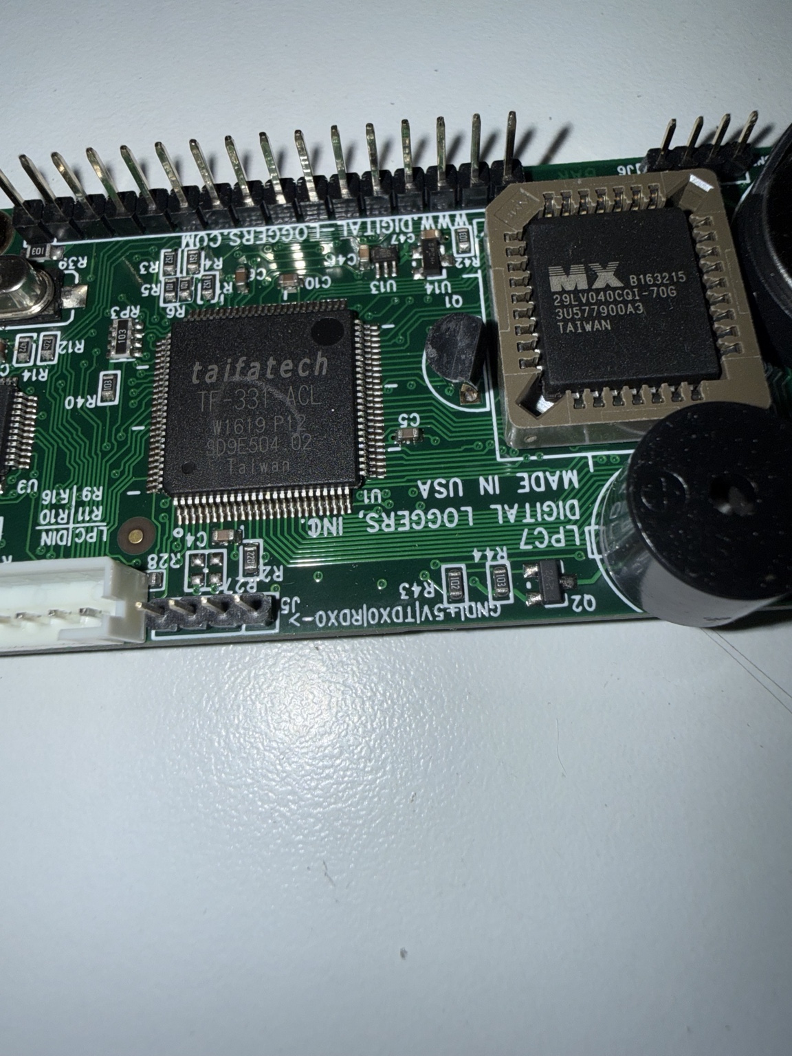 Board close-up: Taifatech TF-331-ACL and socketed Macronix MX29LV040.
