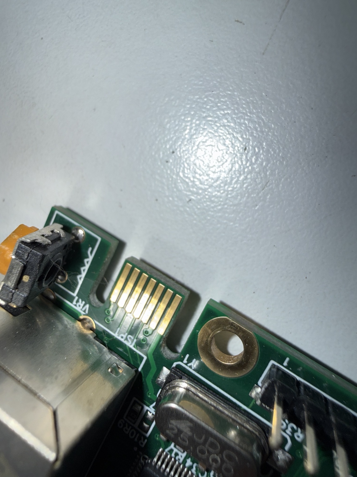 Gold edge-contact interface identified by the board silkscreen as ISP.